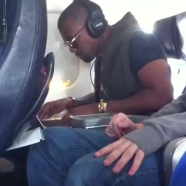 This Video Of Kanye West Jamming Out In Economy Class On A